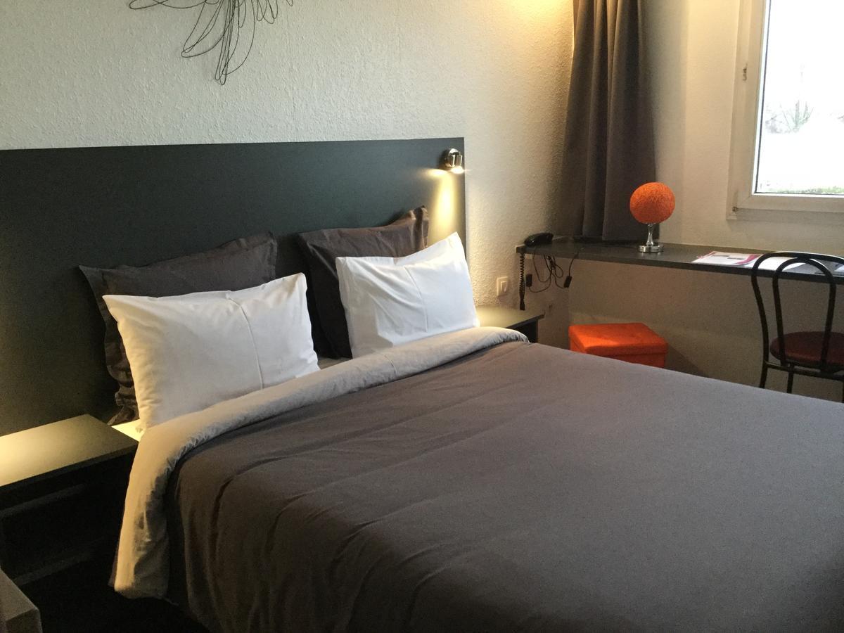 Les Colonnes Strasbourg Zenith Hotel Eckbolsheim Bagian luar foto
